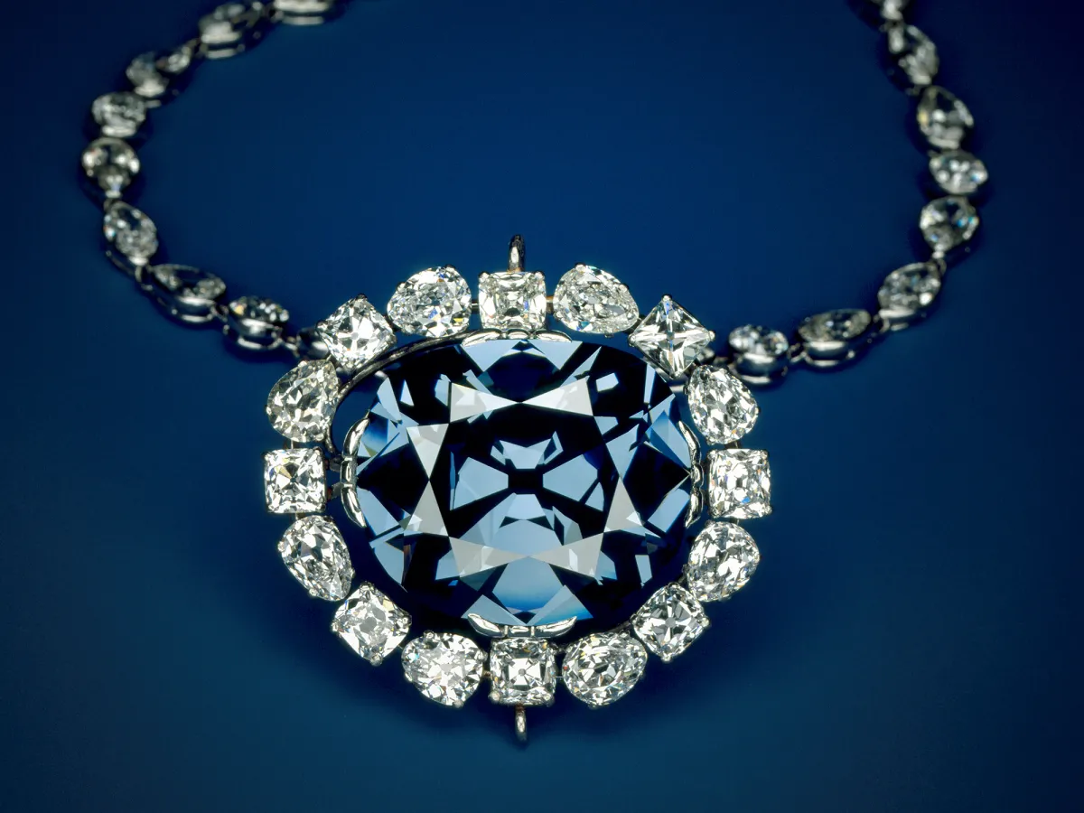 The Hope Diamond necklace, a large blue diamond encircled by smaller white diamonds.